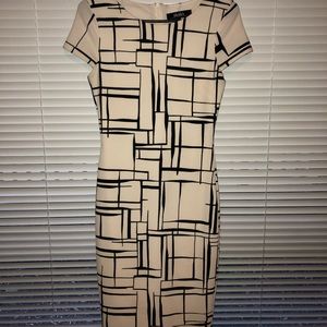 White and black midi dress